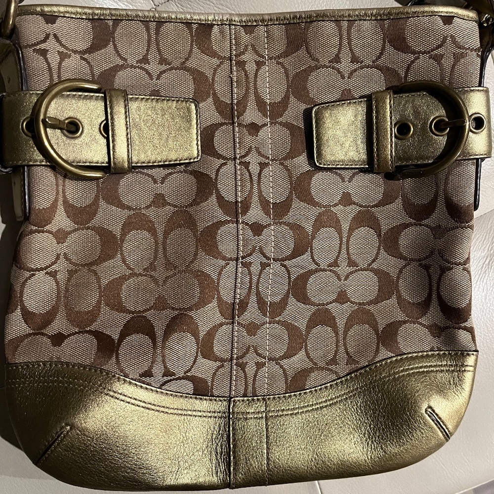 Coach purse with gold detailing